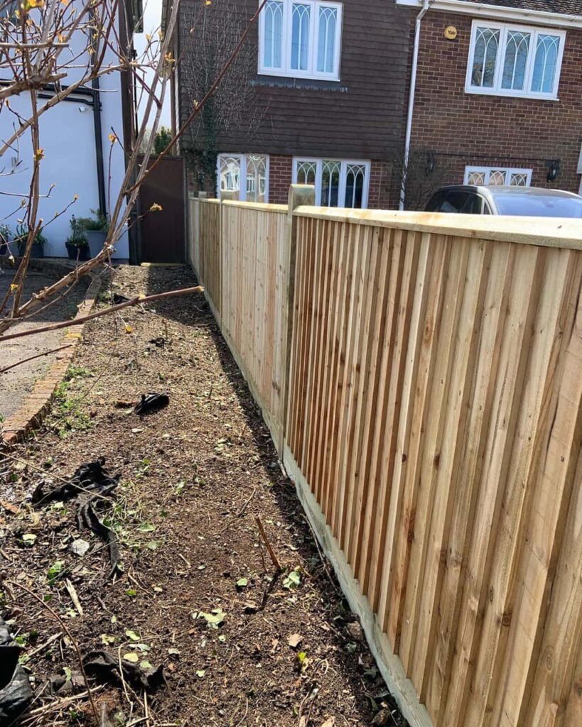 This is a photo of feather edge fencing installed in a residential property by Fast Fix Fencing Swaffham